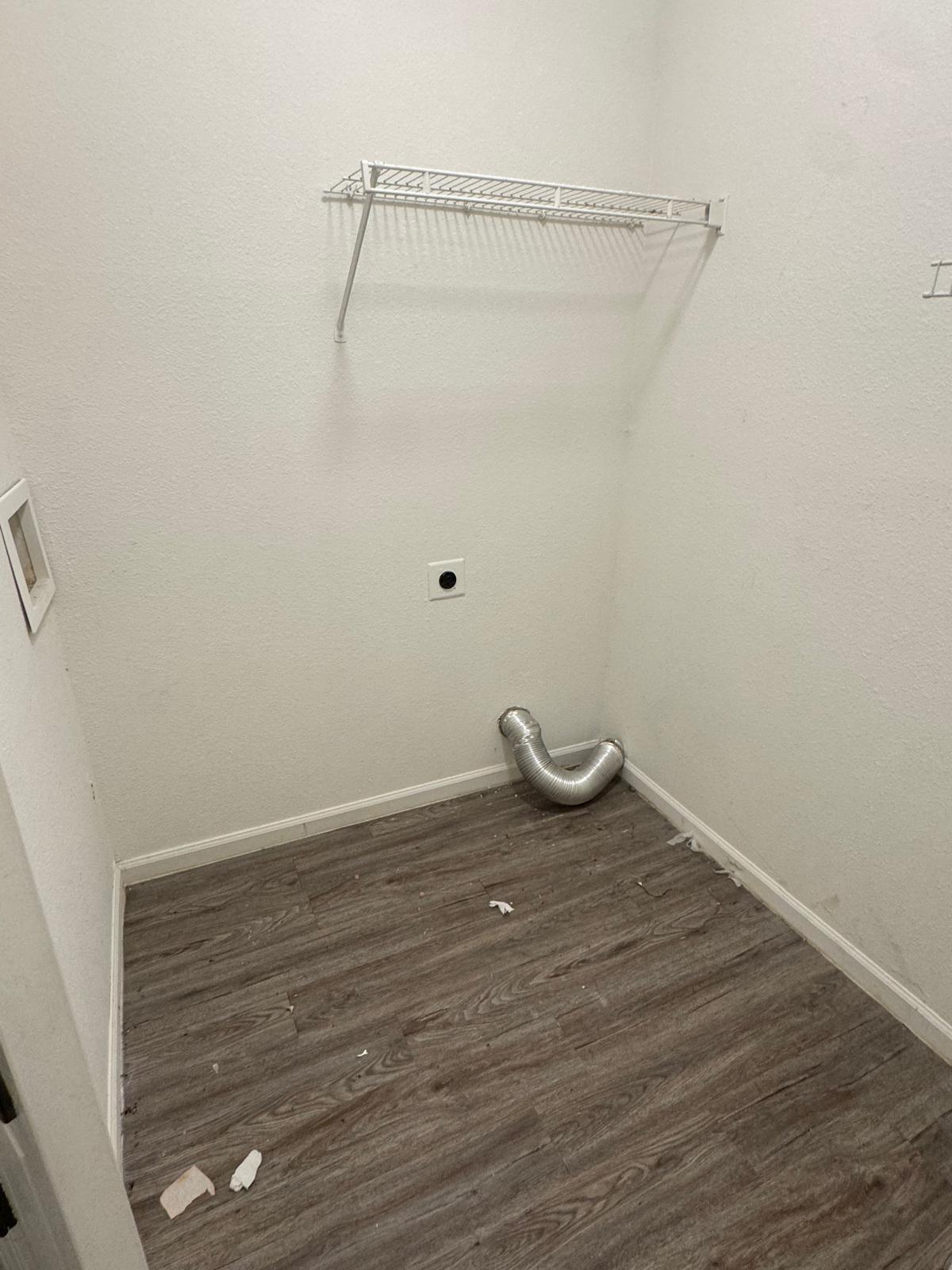 Laundry closet before move-out cleaning service in Overland Park, KS