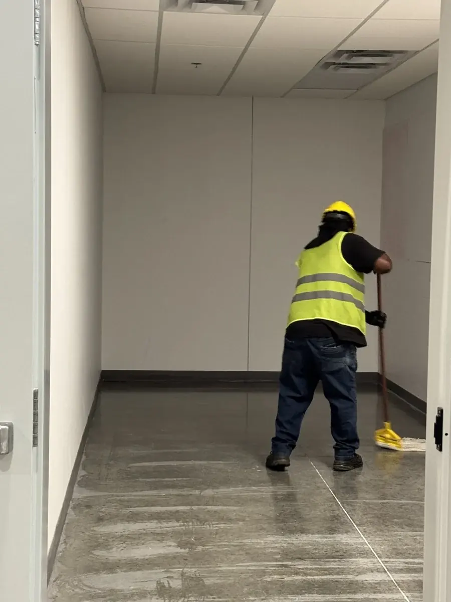 Mopping a commercial floor.