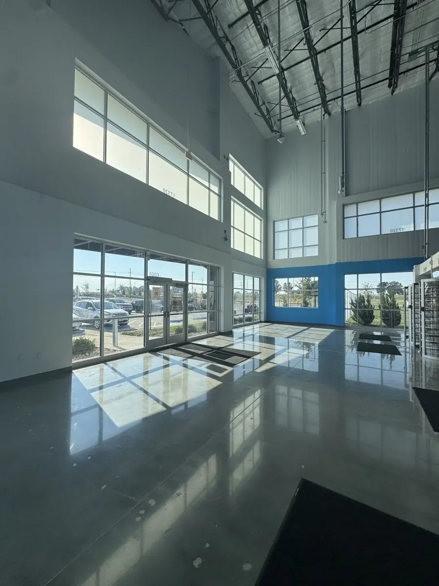 Daylight, glass and reflective lobby floors.